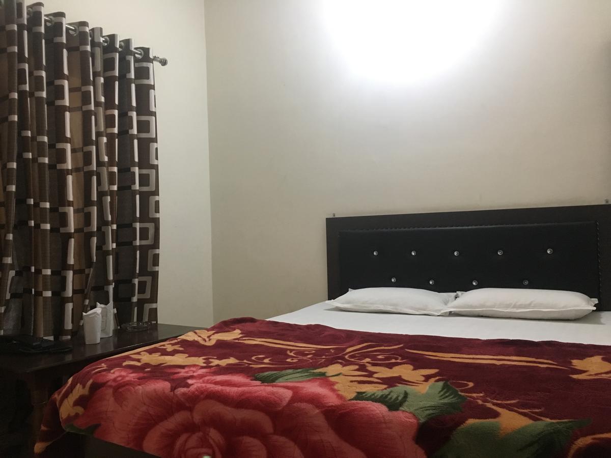 Oyo 12976 Hotel New Fiza 贾姆穆 外观 照片
